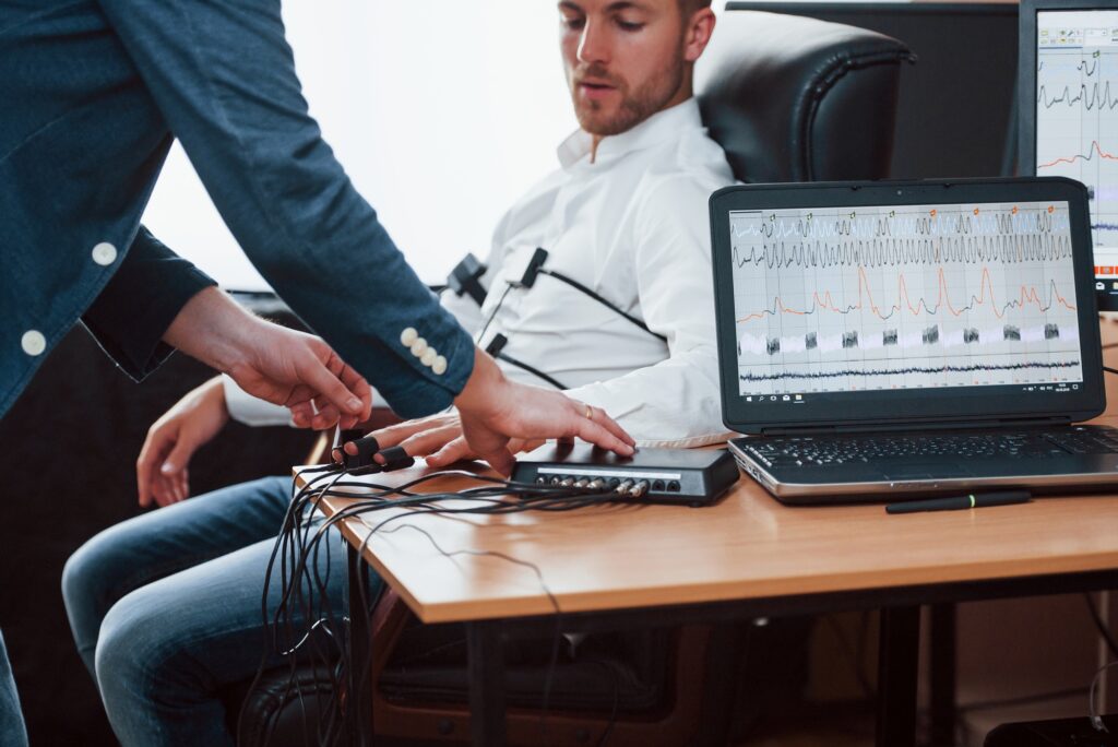 Few minutes and we will done. Preparation for the polygraph test. Conception of the lie detector